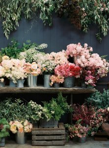 Many buckets of flowers