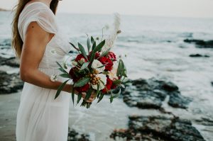 Red and white roses, native gum and grasses bouquet