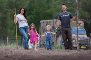 Family of 4 in flower field